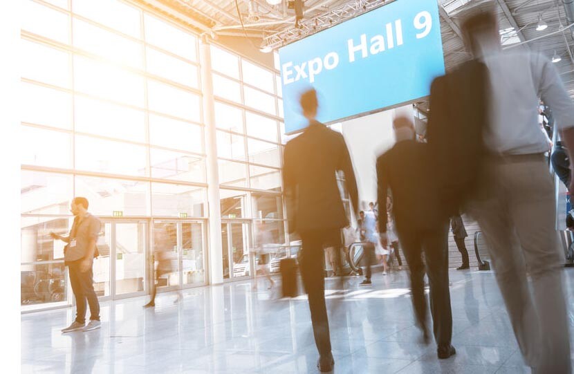 Blurred business people at a expo hall